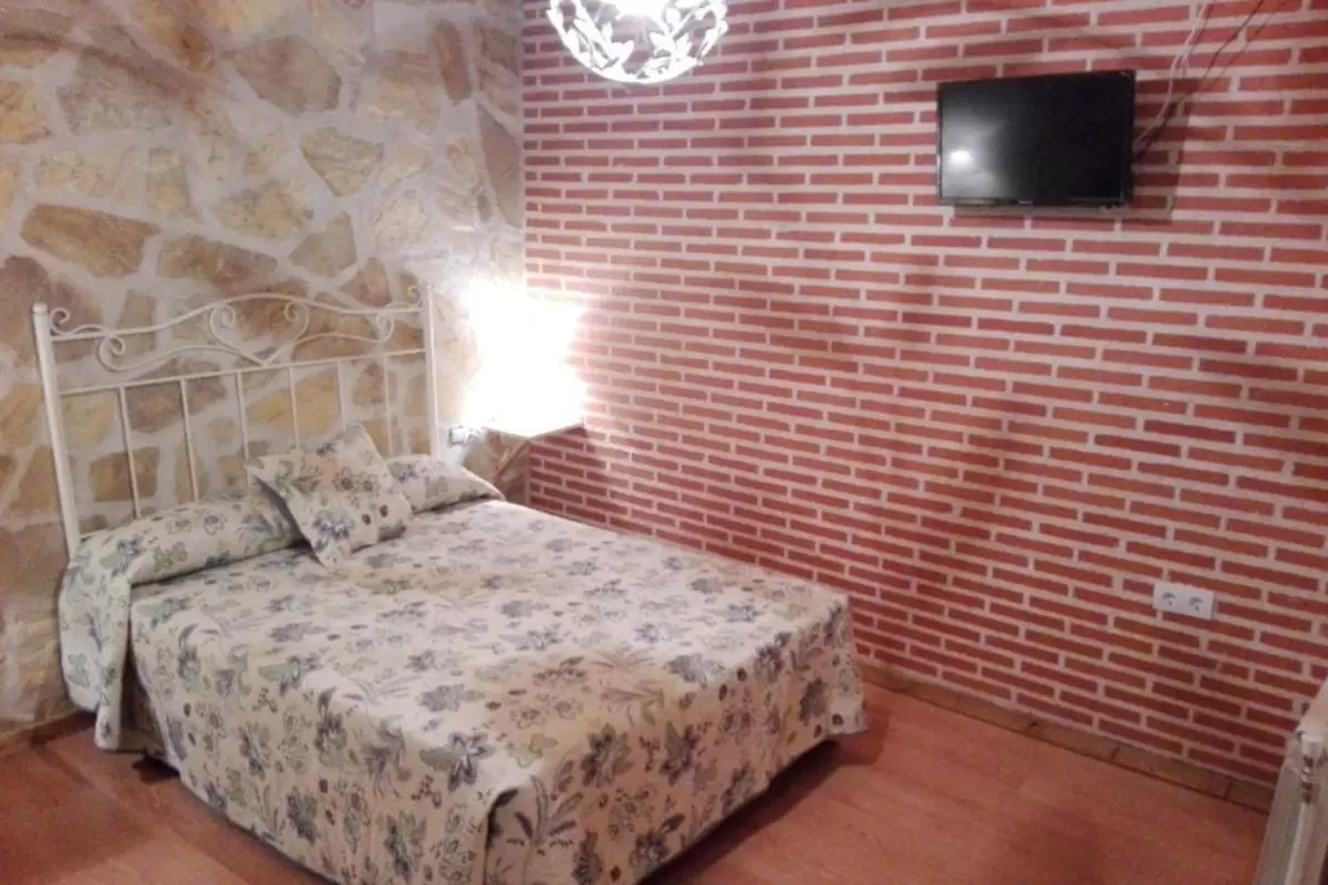 Zona de dormitorio en Abadía del Marqués 